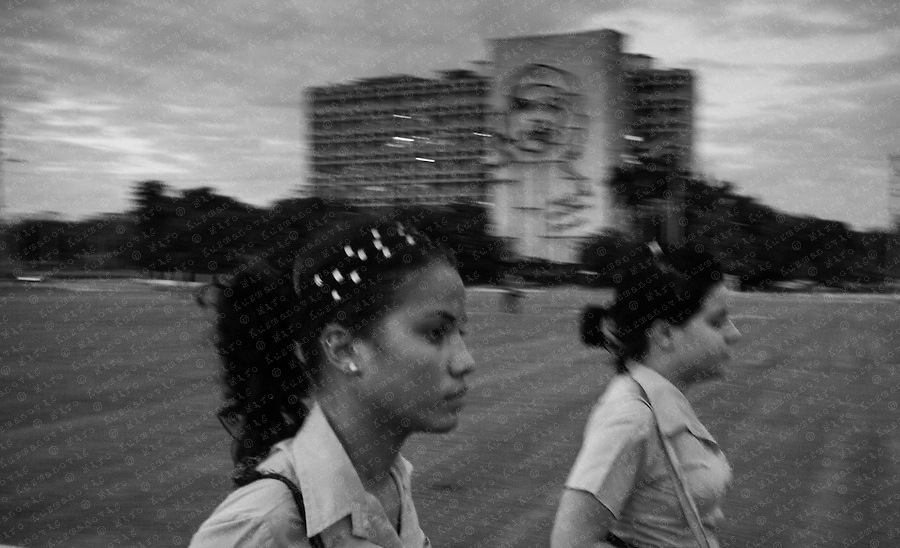 Students walk through the Plaza de la Revolucion (Revolution Square) near the portrait of Che Guevara on the Ministry of the Interior building in Havana. Education in Cuba has been a highly ranked system for many years, as Cuba spends 10 percent of its central budget on education, compared with 4 percent in the United Kingdom and just 2 percent in the United States, according to Unesco.