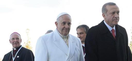 epa04701777 A picture made avaliable on 12 April 2015 of Turkish President Recep Tayyip Erdogan (R) and Pope Francis (C) walk together during a welcoming ceremony as Vatican Nuncio to Turkey, Antonio Lucibello (L) watches them in Ankara, Turkey, 28 November 2014. The Turkish Foreign Ministry on 12 April 2015 summoned the Vatican ambassador to Turkey Antonio Lucibello over remarks by Pope Francis that Armenians were victims of 'the first genocide of the 20th century.' Similar remarks from the Catholic leadership in the past had triggered protests from Turkey, which denies that the mass deportation of Armenians in the Ottoman Empire during World War I was genocide. Armenians say up to 1.5 million people were killed. EPA/STR
